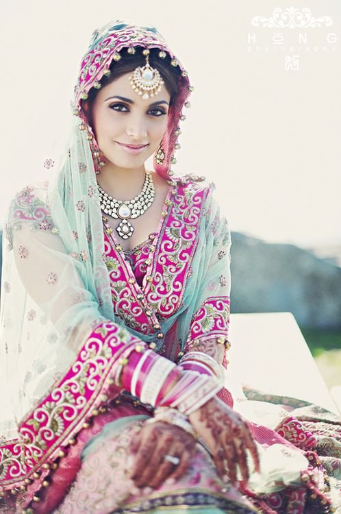 Beautiful Indian woman in traditional dress and jewelry